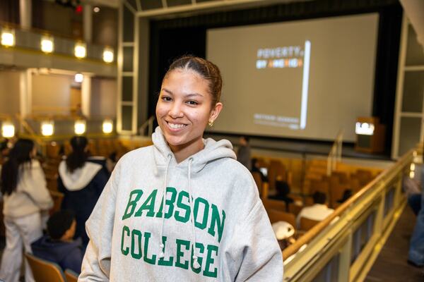 Student wearing a Babson sweatshirt