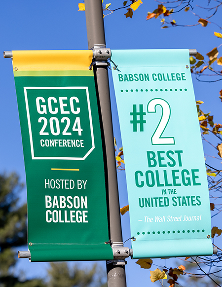 Banners hosting the GCEC conference at Babson