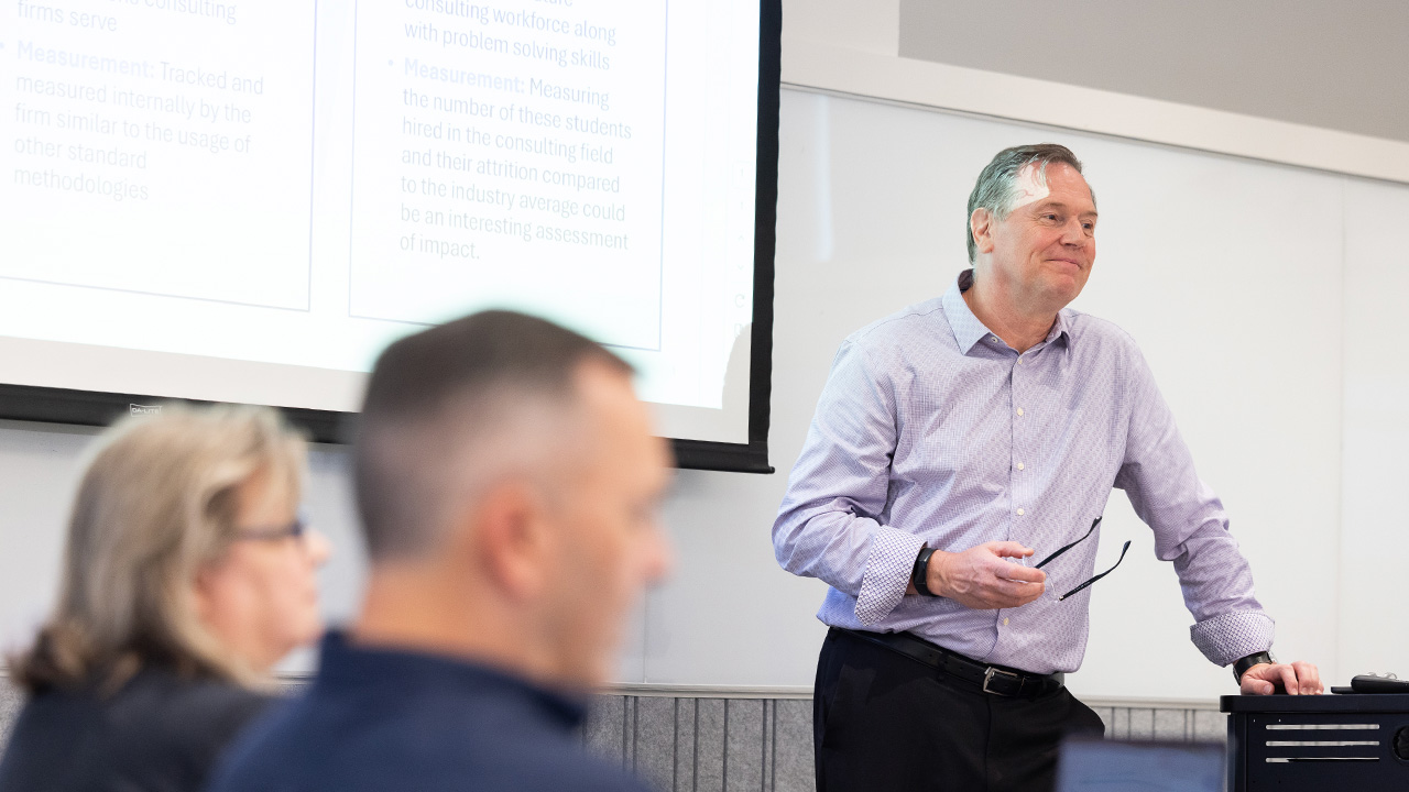 Professor in front of DBA class