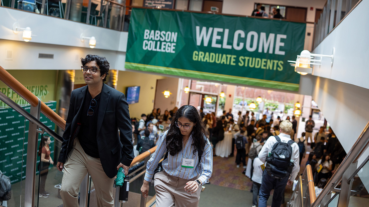 Students on the stairs of the graduate scool