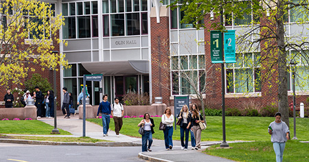 Students walk outside of Olin Hall