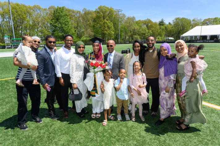 a graduating student celebrating with their family