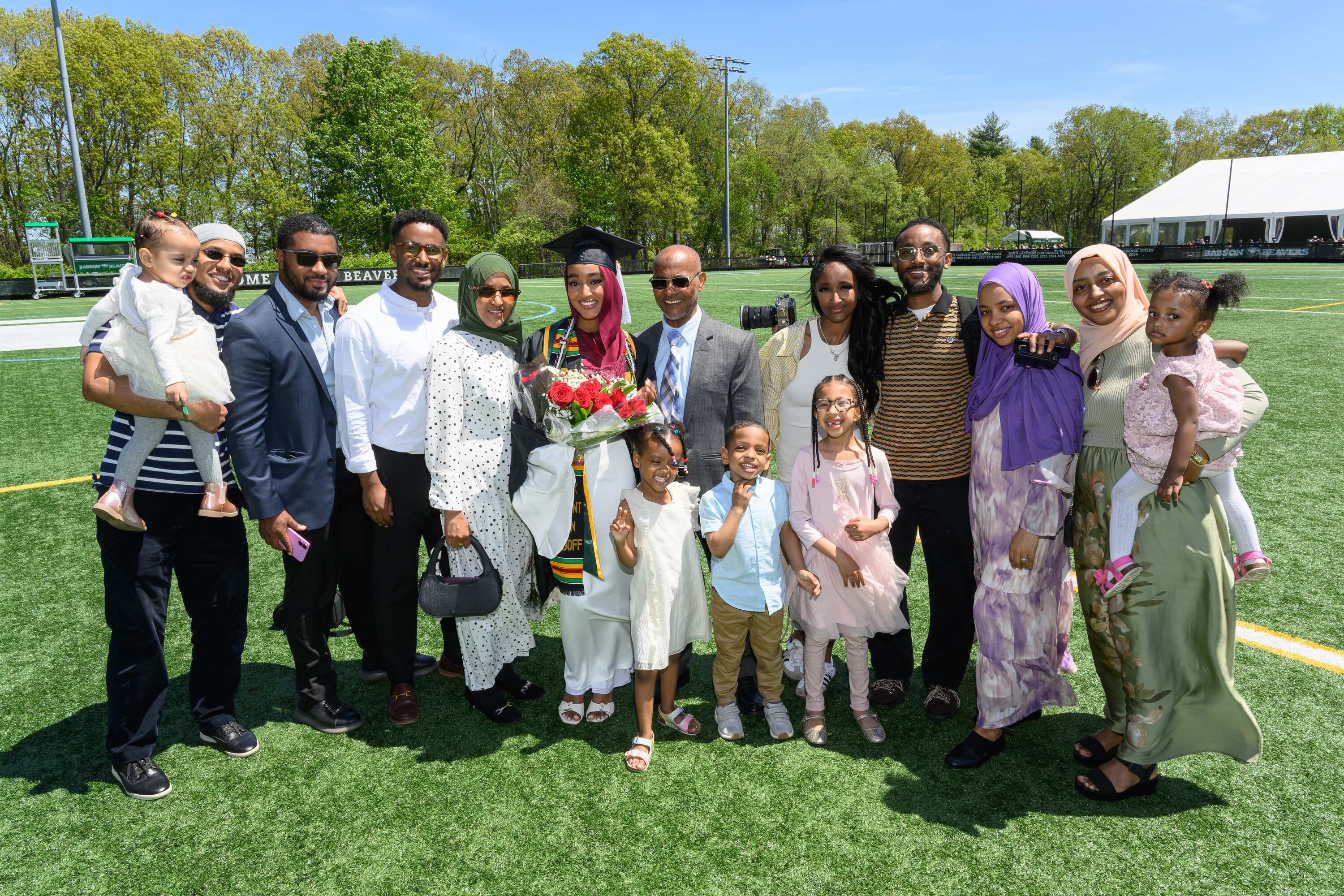 a graduating student celebrating with their family
