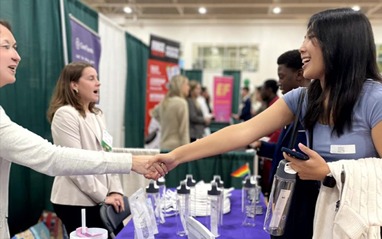 Career Fair with students shaking hands