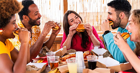 Group eating burgers